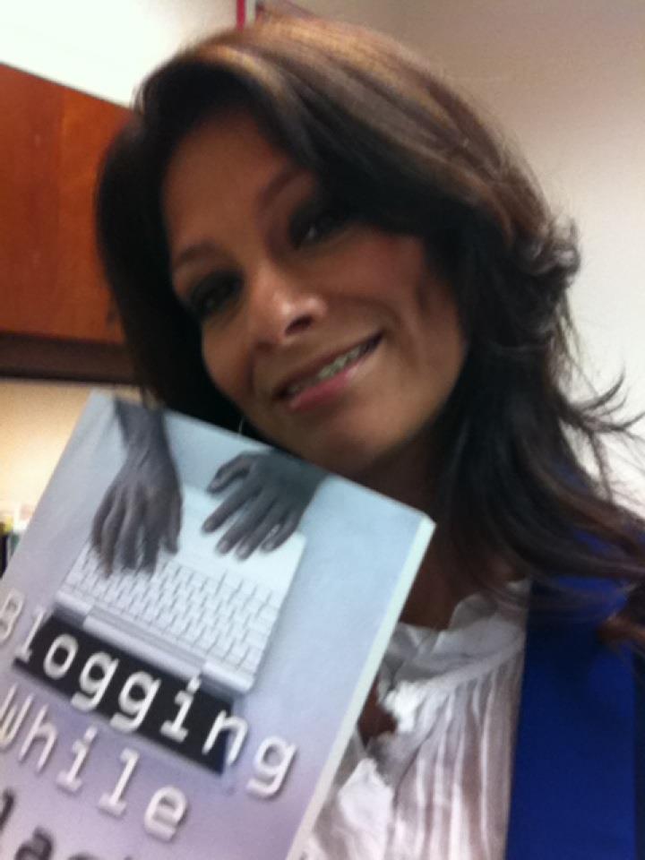 Veronica Torres Hazley and holding her copy of Blogging While Black (available at Amazon.com, Outskirts Press and Barnes and Noble) - Veronica-Torres-Hazley